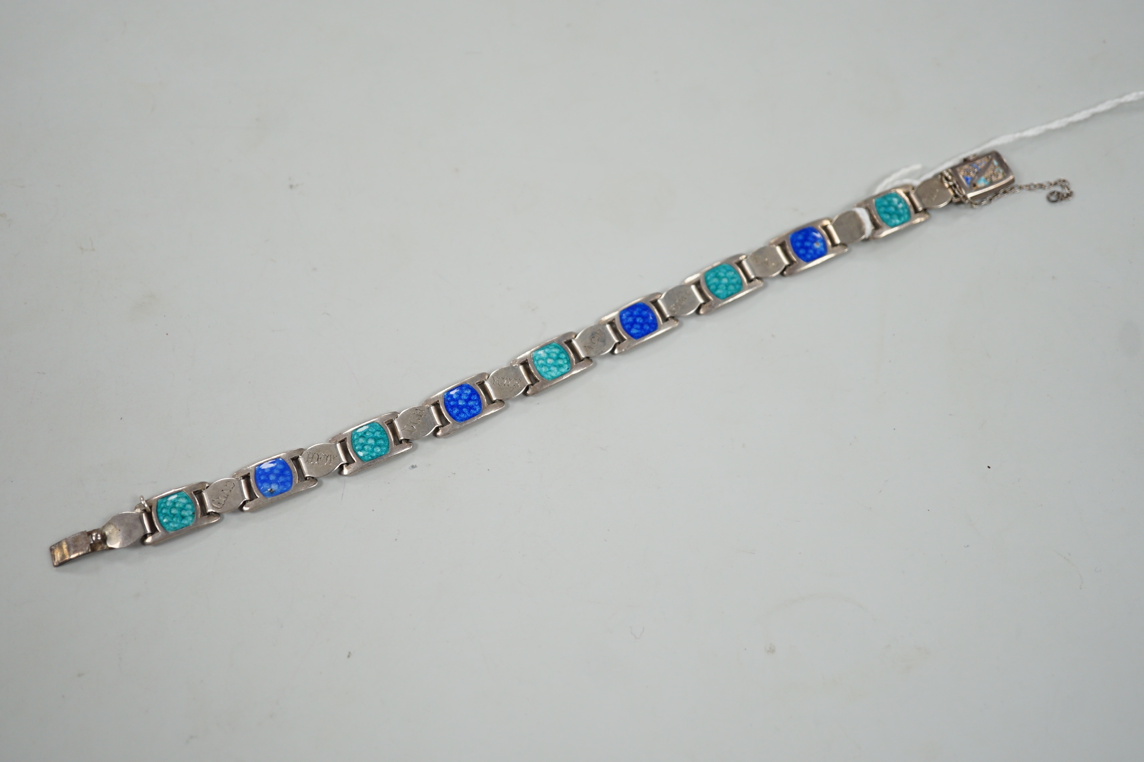 An Edwardian silver and two colour enamel bracelet, engraved with initials and words, 19cm.